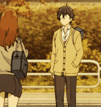 Boy And Girl Standing Next To Each Other GIF