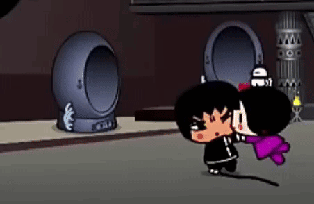 A Boy And A Girl Are Standing Next To Each Other In A Room In Front Of A Door . GIF