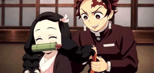 A Boy And A Girl Are Standing Next To Each Other In A Room GIF