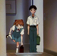 Boy And Girl Standing Next To Each Other GIF