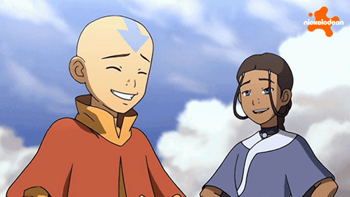 A Boy And A Girl Are Standing Next To Each Other With A Nickelodeon Logo Behind Them GIF