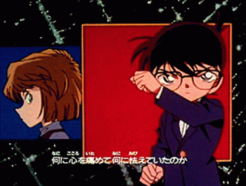 A Boy And A Girl Are Standing Next To Each Other With Foreign Writing On The Bottom GIF