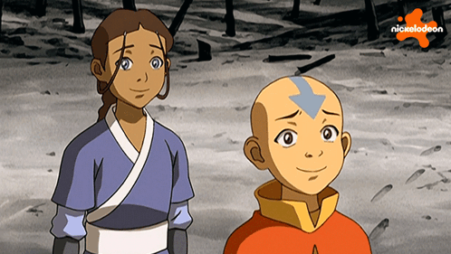 A Boy And A Girl Are Standing Next To Each Other With The Nickelodeon Logo In The Background GIF