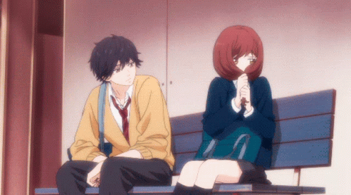 A Boy And A Girl Sitting On A Bench GIF