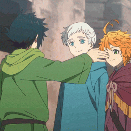 A Boy In A Green Hoodie Is Hugging Another Boy In A Blue Shirt GIF