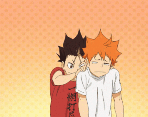 A Boy In A Red Shirt Is Putting His Hand On Another Boy 'S Face GIF