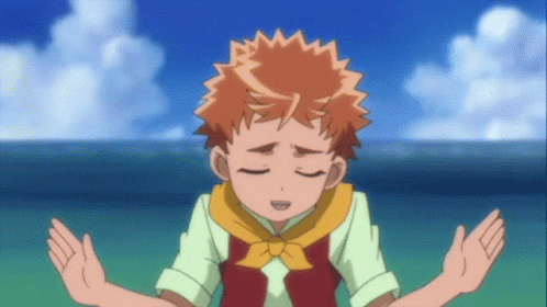 A Boy In A Red Vest With A Yellow Tie Is Praying With His Eyes Closed GIF