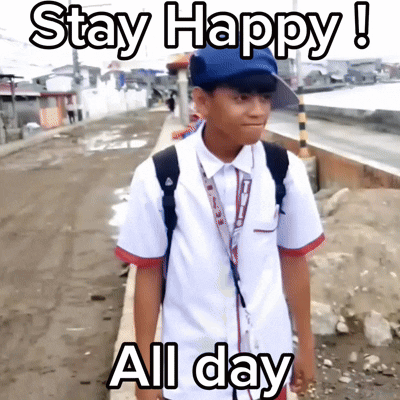 A Boy In A School Uniform Is Standing On A Sidewalk With The Words Stay Happy All Day Written Above Him GIF