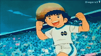 a boy in a soccer uniform with the number 8 on it