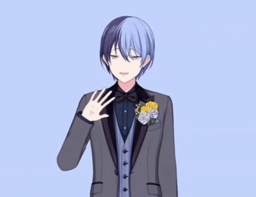 A Boy In A Tuxedo With Flowers In His Pocket Waving GIF
