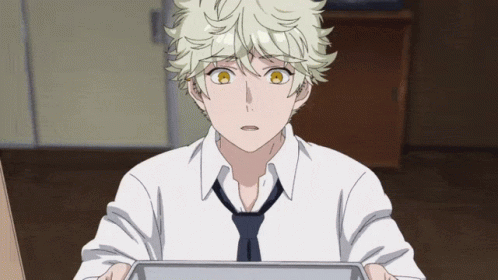 A Boy In A White Shirt And Tie Is Holding A Tray GIF