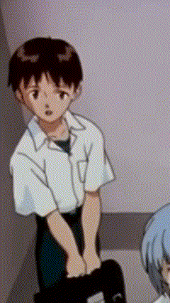 A Boy In A White Shirt Is Standing Next To A Girl In A Blue Dress . GIF