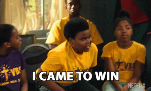 A Boy In A Yellow Shirt Says I Came To Win In Front Of A Group Of People GIF