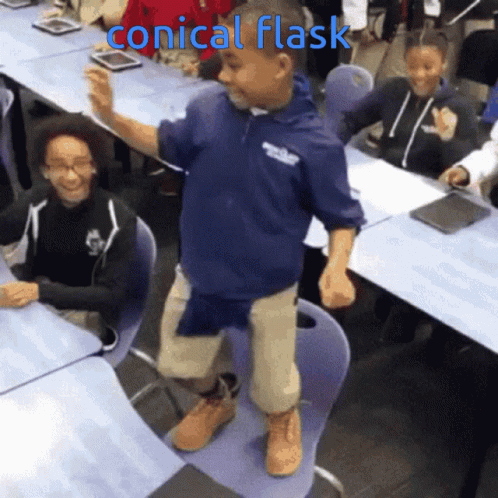 A Boy Is Dancing In A Classroom With The Words Conical Flask Written Above Him GIF