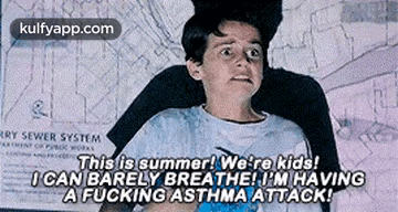 A Boy Is Sitting In Front Of A Sign That Says This Is Summer We 'Re Kids I Can Barely Breathe GIF
