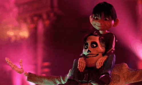 A Boy Is Sitting On A Skeleton 'S Shoulders In A Dark Room GIF