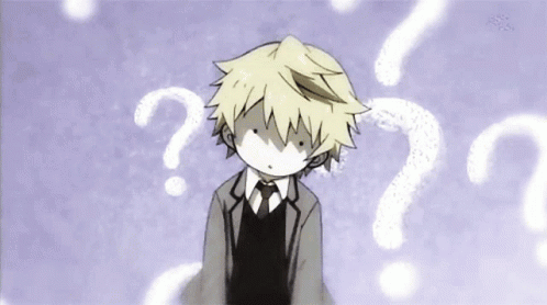 A Boy Is Standing In Front Of A Bunch Of Question Marks GIF