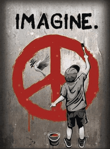A Boy Paints A Peace Sign On A Wall With The Words Imagine Below It GIF