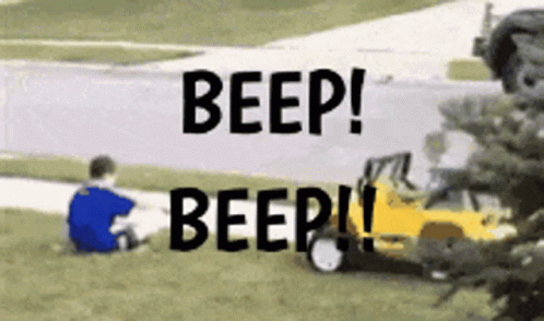 A Boy Sits In The Grass With The Words Beep Beep Written Above Him GIF