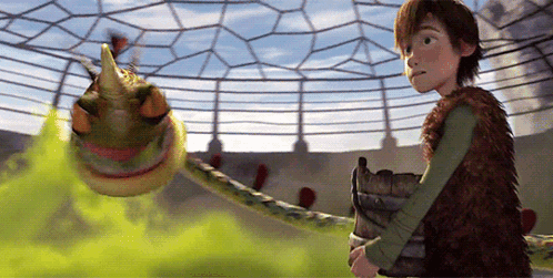A Boy Standing Next To A Snake With A Green Smoke Coming Out Of It GIF