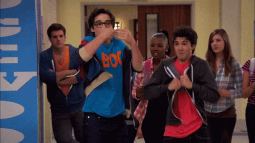 A Boy Wearing A Blue Shirt That Says Boc GIF