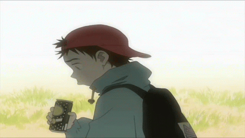 A Boy Wearing A Red Hat Holds A Can Of Soda In His Hand GIF