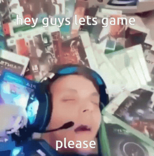 a boy wearing headphones and a microphone is laying on a pile of video games with the words hey guys lets game please be