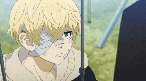 A Boy With A Bandage On His Face Is Sitting On A Swing Set GIF
