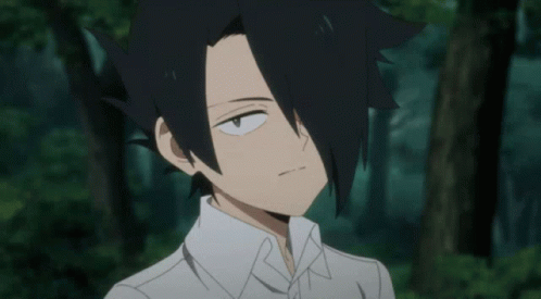 A Boy With Black Hair And A White Shirt Is Smiling And Waving His Hand GIF
