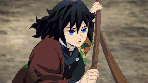 A Boy With Blue Eyes Is Holding Onto A Wooden Stick GIF