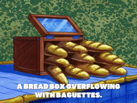 A Bread Box Overflow With Baguettes GIF