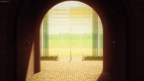A Brick Archway Leading To A Baseball Field With A Sign That Says Anime.tv GIF