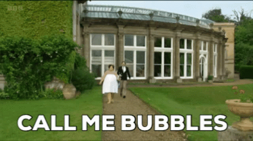 A Bride And Groom Walking Down A Path With The Words Call Me Bubbles GIF