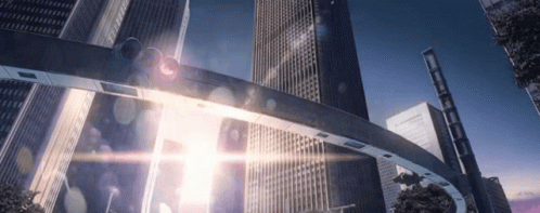 A Bridge In The Middle Of A City With A Lot Of Skyscrapers In The Background . GIF