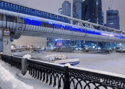 A Bridge Over A Body Of Water With A Sign That Says 145 GIF