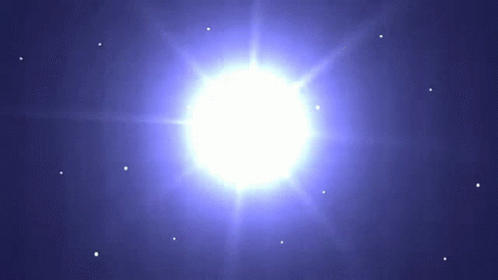a bright white star is surrounded by smaller stars in a blue sky