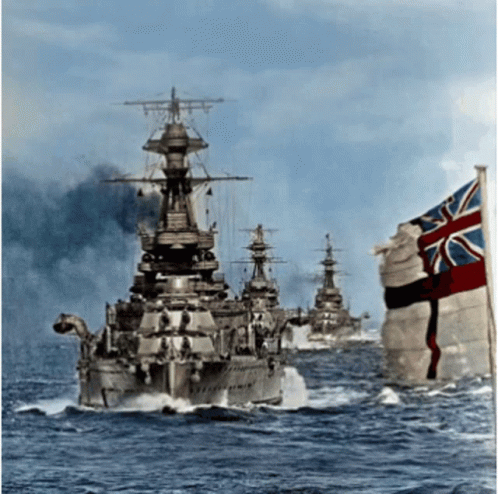 A British Flag Is Flying In Front Of A Group Of Ships GIF