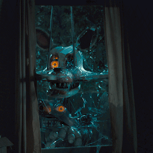 A Broken Glass Window With A Cartoon Character Behind It GIF