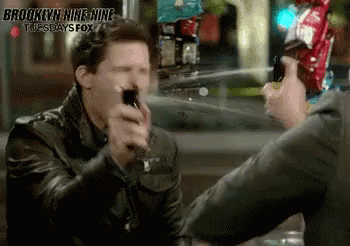 A Brooklyn Nine-Nine Advertisement With Two Men GIF
