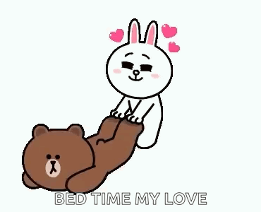 A Brown Bear And A White Rabbit Are Laying On Each Other . GIF