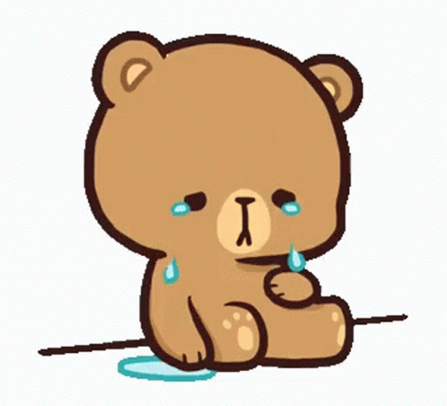 A Brown Teddy Bear Is Sitting On The Ground And Crying . GIF
