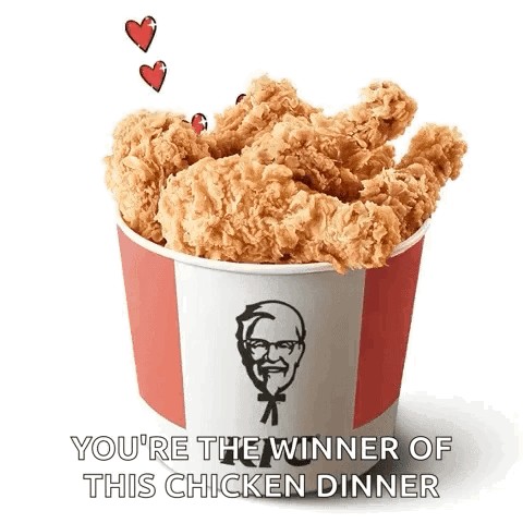 A Bucket Of Fried Chicken With The Words `` You 'Re The Winner Of This Chicken Dinner '' . GIF