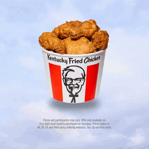 A Bucket Of Kentucky Fried Chicken Is Floating In The Sky GIF
