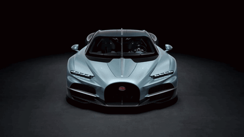 a bugatti car is shown in a dark room