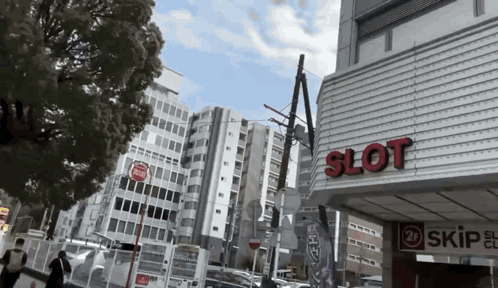 A Building With The Word Slot On The Side Of It GIF