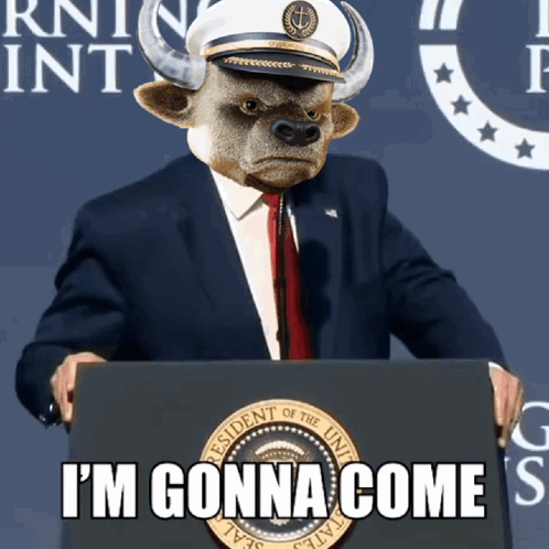 A Bull In A Suit And Hat Stands Behind A Podium With The Words I 'M Gonna Come On It GIF