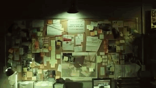 A Bulletin Board With A Lot Of Sticky Notes On It GIF