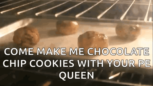 A Bunch Of Cookies Are Sitting On A Baking Sheet In An Oven . GIF