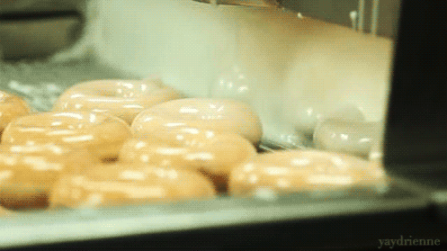 A Bunch Of Donuts Are Being Cooked In A Microwave Oven With The Words Yaydrienne Written On The Bottom GIF