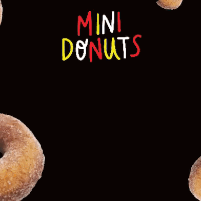 A Bunch Of Donuts On A Black Background With The Word Mini Donuts GIF